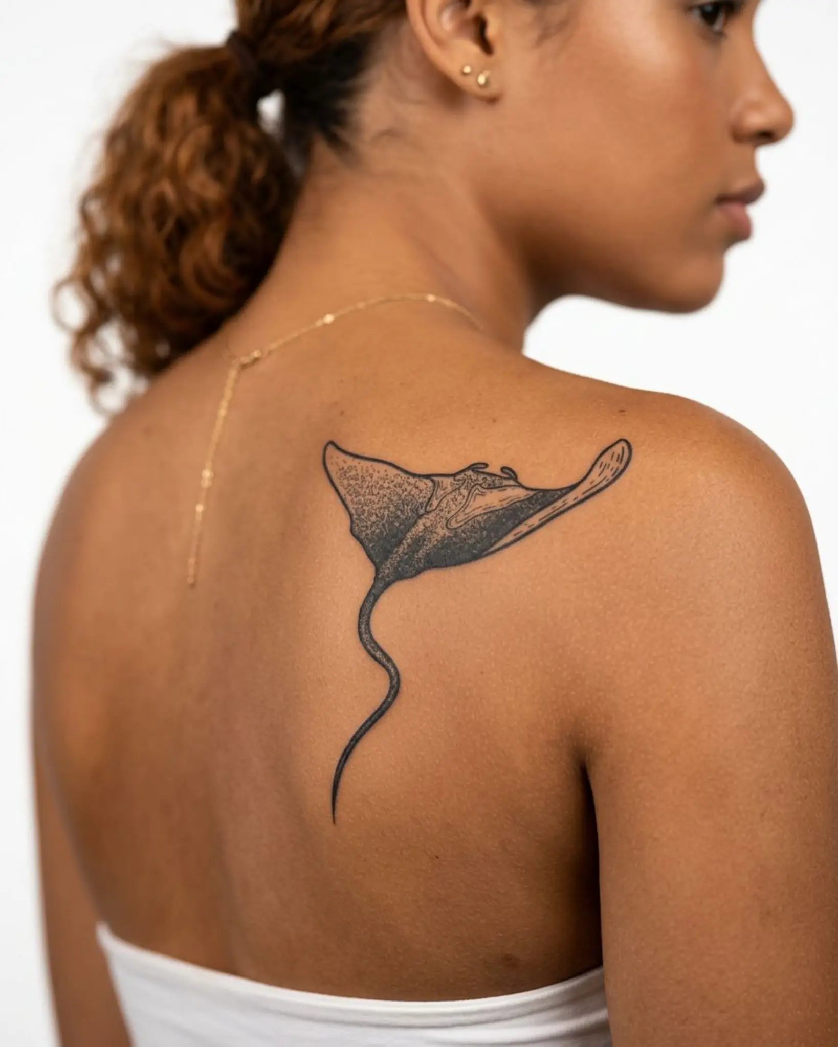 INKY Manta Ray 2 semi-permanent tattoo applied on a woman – 4 x 7 in (10x17 cm) design, realistic ink look, lasts 10 days