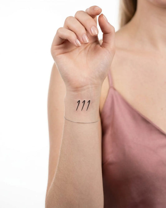 INKY Angel 111 semi-permanent tattoo applied on a woman – 2 x 2 in (4x4 cm) design, realistic ink look, lasts 10 days