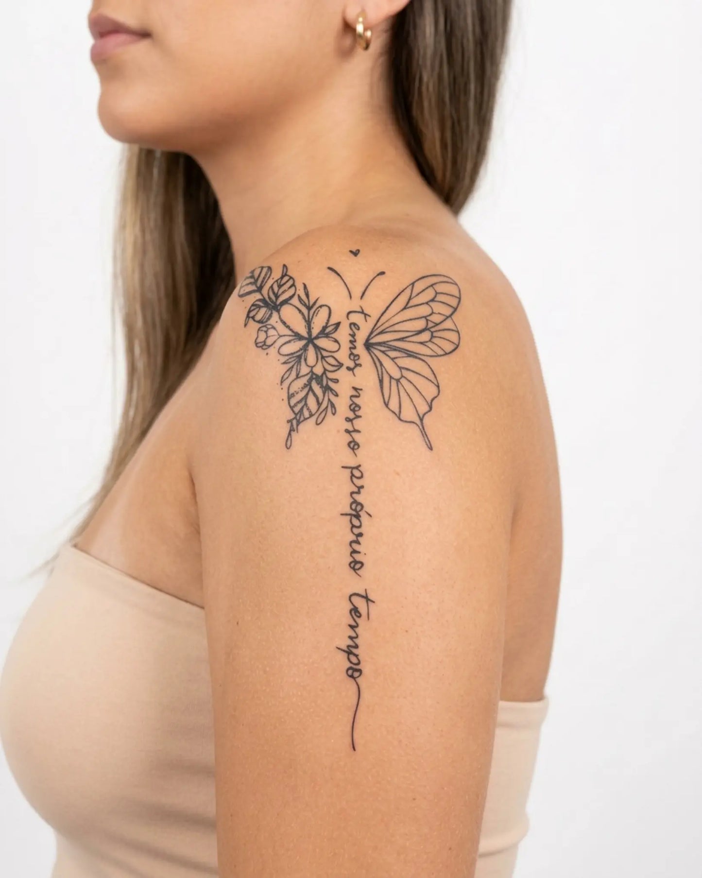 INKY TimeFly semi-permanent tattoo applied on a woman – 4 x 7 in (10x17 cm) design, realistic ink look, lasts 10 days