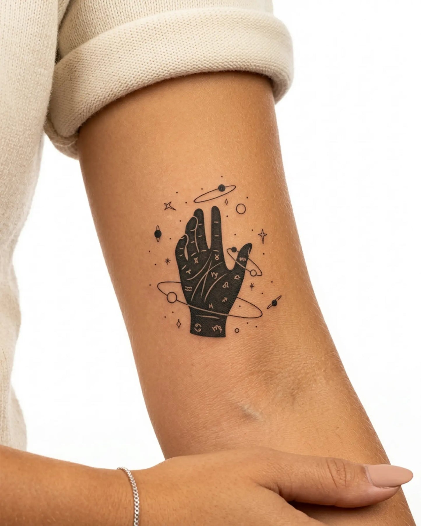 INKY Zodiac Palm semi-permanent tattoo applied on a woman – 3 x 3 in (7x7 cm) design, realistic ink look, lasts 10 days