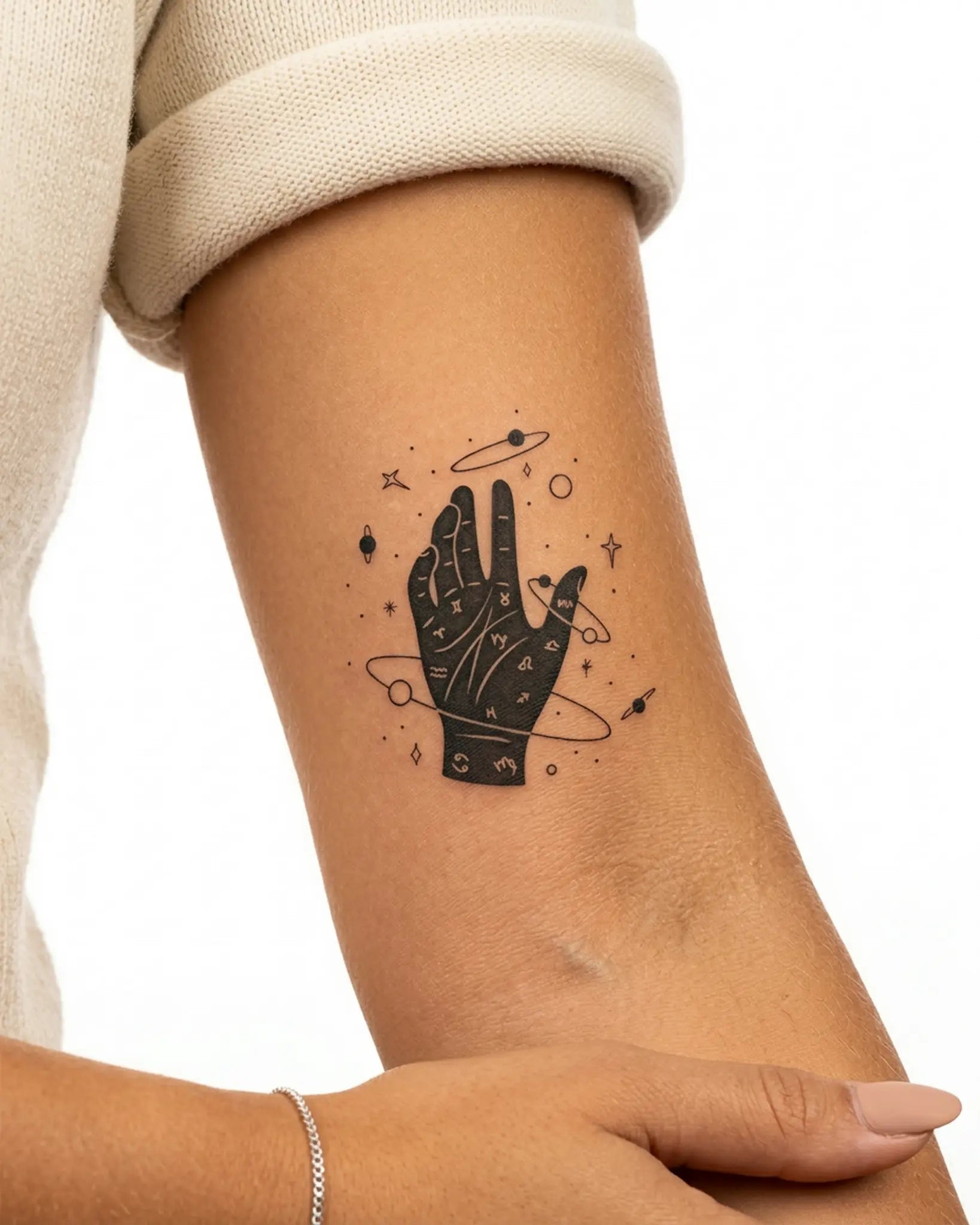 INKY Zodiac Palm semi-permanent tattoo applied on a woman – 3 x 3 in (7x7 cm) design, realistic ink look, lasts 10 days
