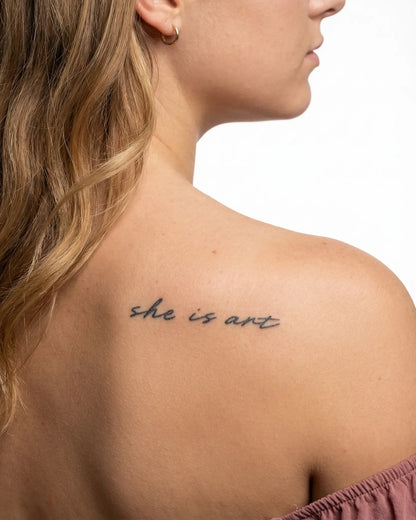 INKY She Is Art 2 semi-permanent tattoo applied on a woman – 2 x 4 in (6x10 cm) design, realistic ink look, lasts 10 days