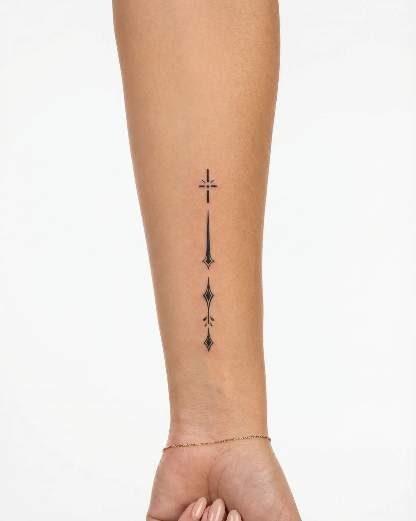 INKY Celestial Dro semi-permanent tattoo applied on a woman – 2 x 4 in (6x10 cm) design, realistic ink look, lasts 10 days