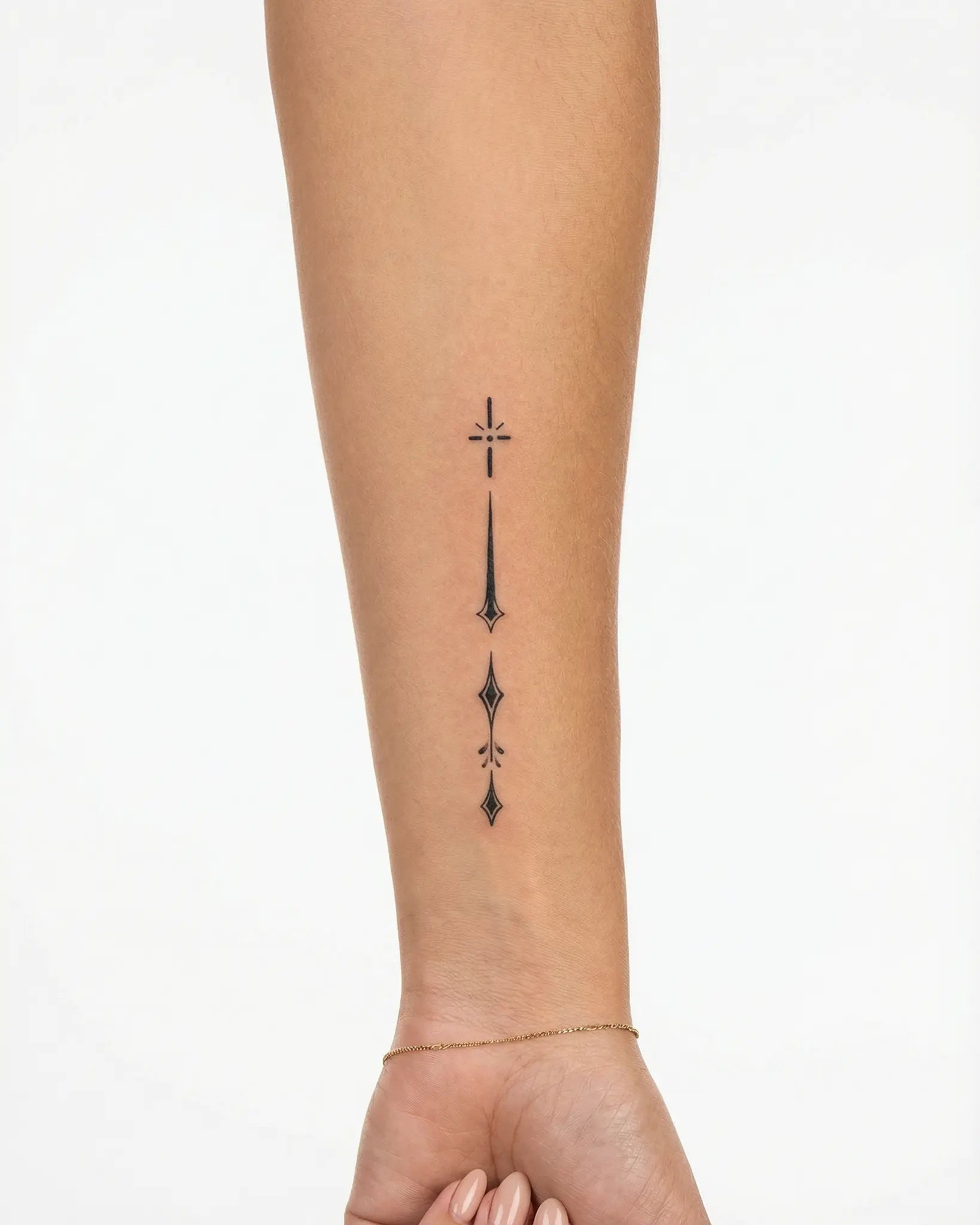 INKY Celestial Dro semi-permanent tattoo applied on a woman – 2 x 4 in (6x10 cm) design, realistic ink look, lasts 10 days