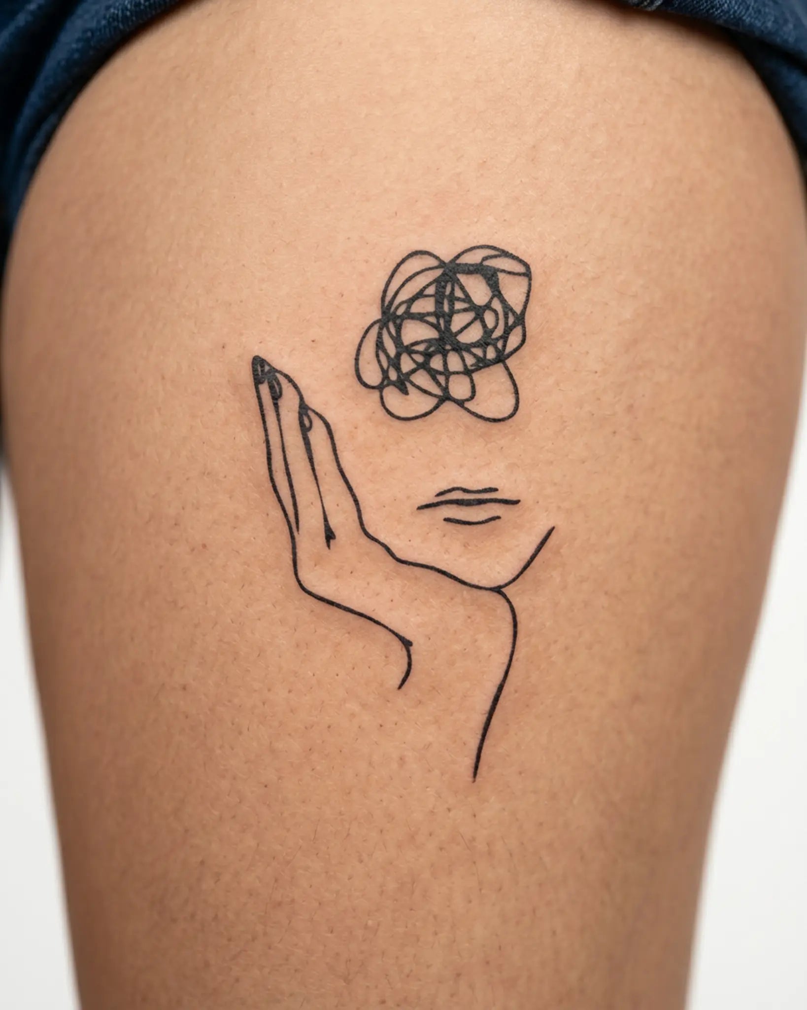 INKY Tangled Mind semi-permanent tattoo applied on a woman – 3 x 4 in (7x10 cm) design, realistic ink look, lasts 10 days