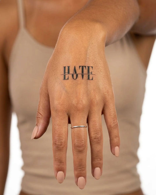 INKY Love Hate semi-permanent tattoo applied on a woman – 2 x 2 in (4x4 cm) design, realistic ink look, lasts 10 days