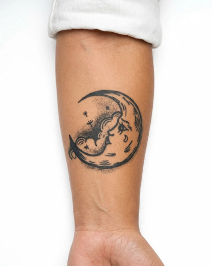 INKY Lunar Tears semi-permanent tattoo applied on a woman – 3 x 3 in (7x7 cm) design, realistic ink look, lasts 10 days