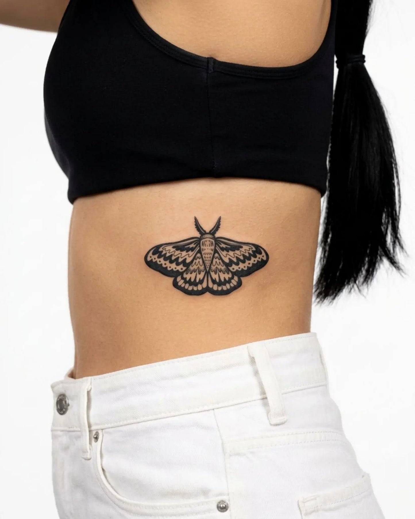 INKY Moon Moth semi-permanent tattoo applied on a woman – 3 x 4 in (7x10 cm) design, realistic ink look, lasts 10 days
