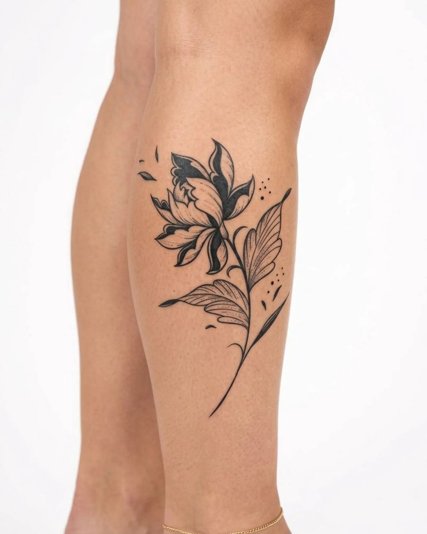 INKY Bloom Noir 2 semi-permanent tattoo applied on a woman – 3 x 4 in (7x10 cm) design, realistic ink look, lasts 10 days
