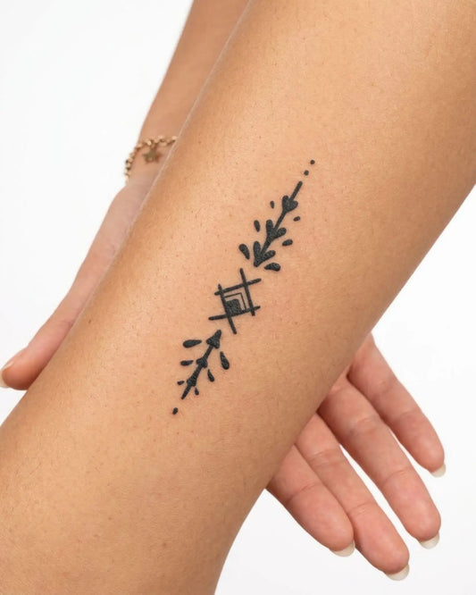 INKY Spirit Line semi-permanent tattoo applied on a woman – 2 x 4 in (6x10 cm) design, realistic ink look, lasts 10 days