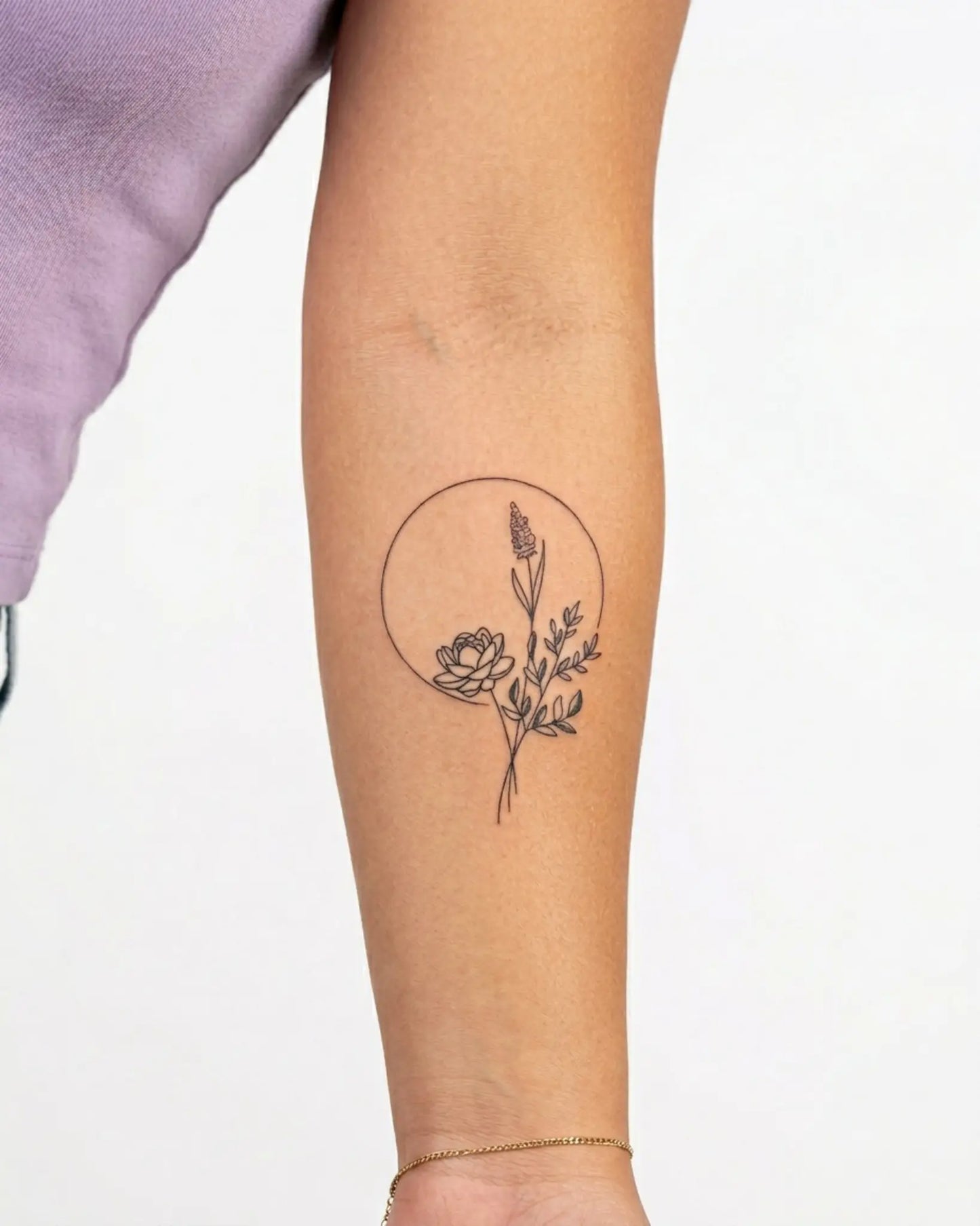 INKY Botanical Arc 2 semi-permanent tattoo applied on a woman – 3 x 4 in (7x10 cm) design, realistic ink look, lasts 10 days