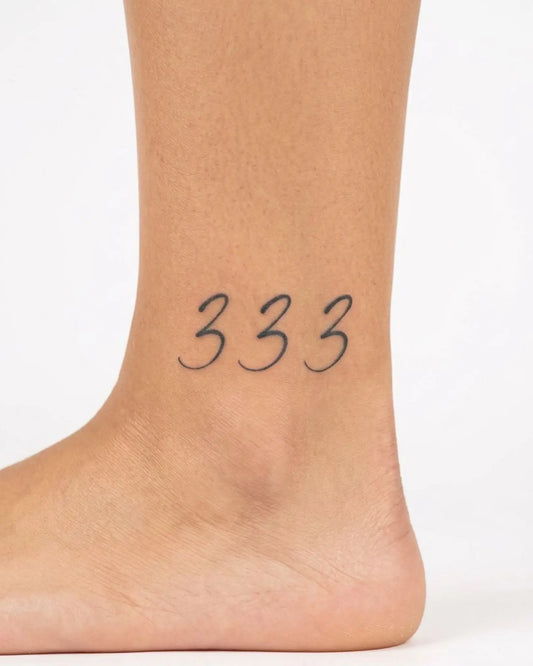 INKY Angel 333 semi-permanent tattoo applied on a woman – 2 x 2 in (4x4 cm) design, realistic ink look, lasts 10 days