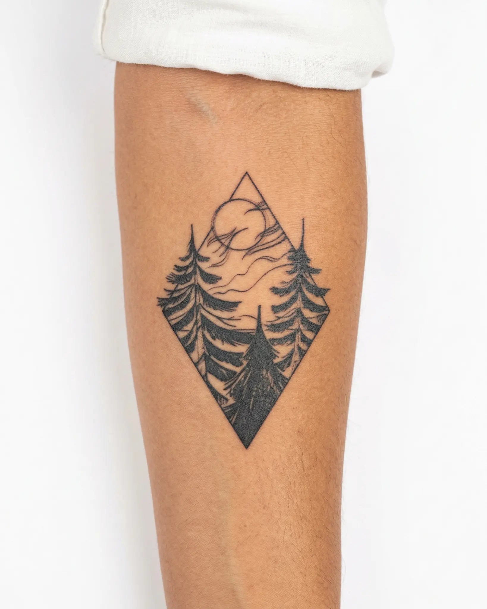 INKY Pine Diamond semi-permanent tattoo applied on a woman – 3 x 4 in (7x10 cm) design, realistic ink look, lasts 10 days