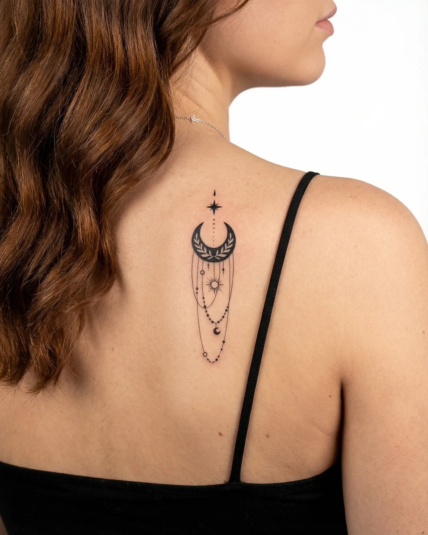 INKY Mystic Moon semi-permanent tattoo applied on a woman – 2 x 4 in (6x10 cm) design, realistic ink look, lasts 10 days
