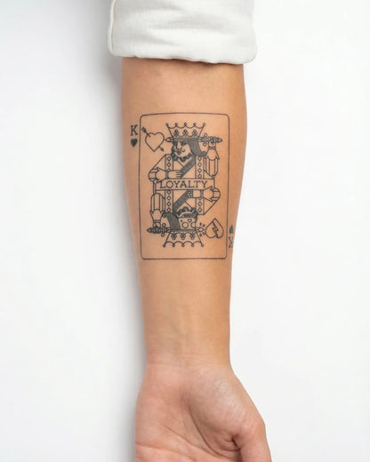 INKY Loyalty King semi-permanent tattoo applied on a woman – 3 x 4 in (7x10 cm) design, realistic ink look, lasts 10 days