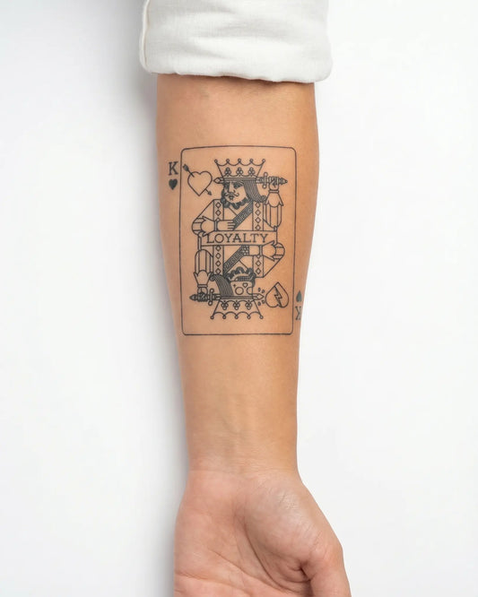 INKY Loyalty King semi-permanent tattoo applied on a woman – 3 x 4 in (7x10 cm) design, realistic ink look, lasts 10 days