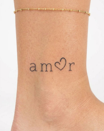 INKY Amor Heart semi-permanent tattoo applied on a woman – 2 x 2 in (4x4 cm) design, realistic ink look, lasts 10 days