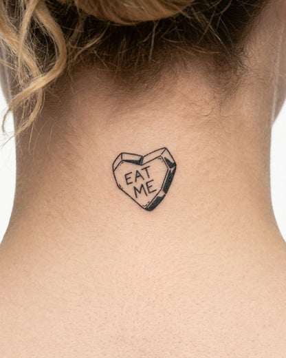 INKY Eat Me Heart semi-permanent tattoo applied on a woman – 2 x 2 in (4x4 cm) design, realistic ink look, lasts 10 days