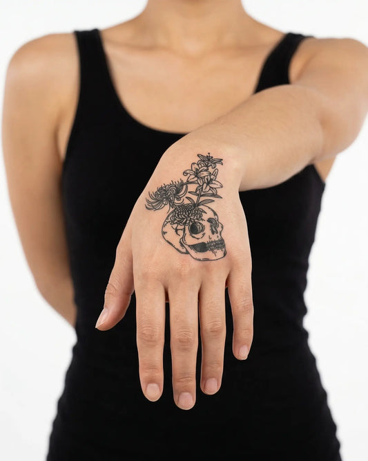 INKY Skull Bloom 2 semi-permanent tattoo applied on a woman – 2 x 2 in (4x4 cm) design, realistic ink look, lasts 10 days