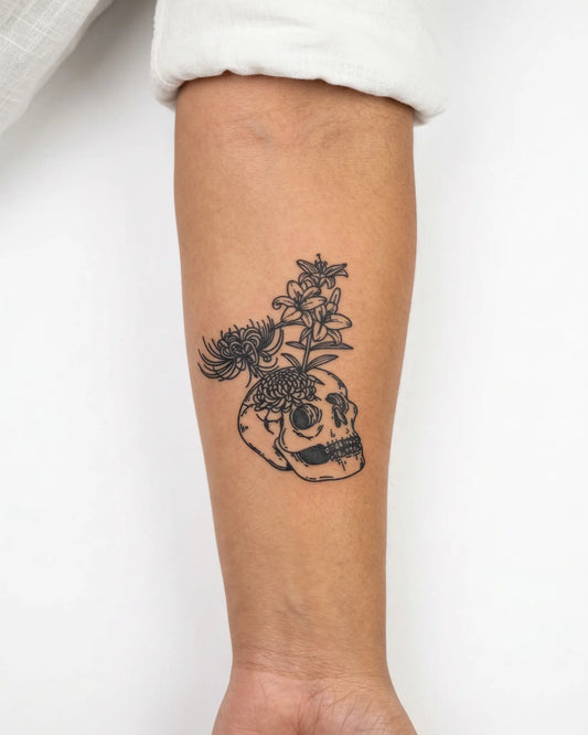 INKY Skull Bloom semi-permanent tattoo applied on a woman – 3 x 4 in (7x10 cm) design, realistic ink look, lasts 10 days