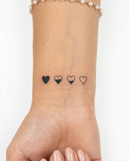 INKY Love Meter 2 semi-permanent tattoo applied on a woman – 2 x 2 in (4x4 cm) design, realistic ink look, lasts 10 days
