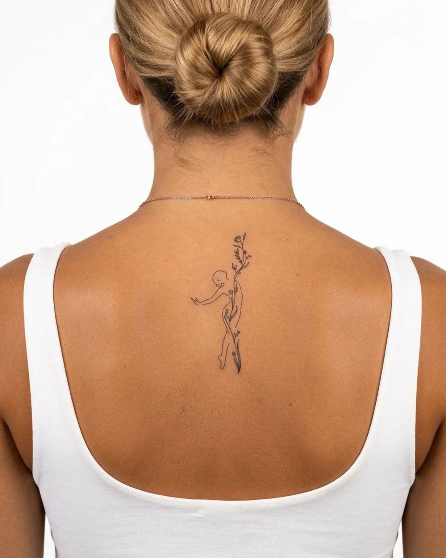 INKY Bloom Form semi-permanent tattoo applied on a woman – 2 x 4 in (6x10 cm) design, realistic ink look, lasts 10 days