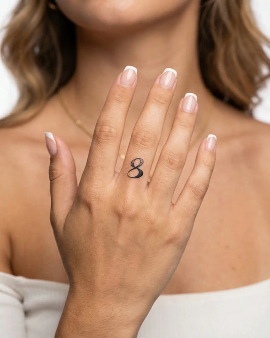 INKY Infinity 8 semi-permanent tattoo applied on a woman – 0.5 x 0.5 in (1x1 cm) design, realistic ink look, lasts 10 days