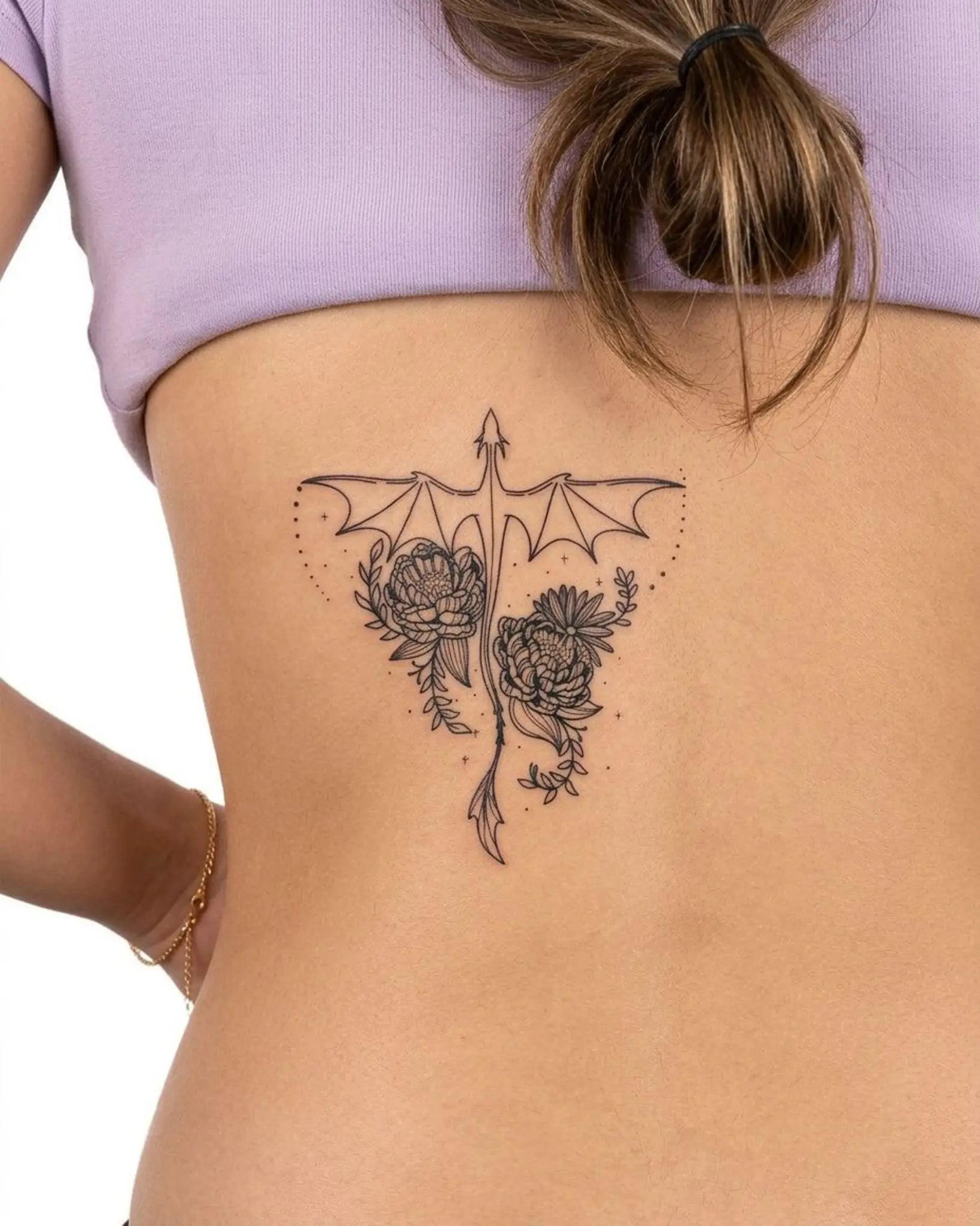 INKY Draconic Bloo semi-permanent tattoo applied on a woman – 3 x 3 in (7x7 cm) design, realistic ink look, lasts 10 days