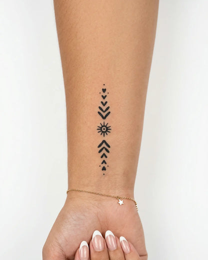 INKY Boho Line semi-permanent tattoo applied on a woman – 2 x 4 in (6x10 cm) design, realistic ink look, lasts 10 days