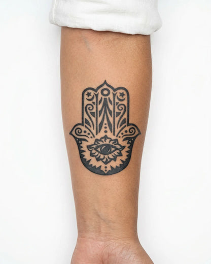 INKY Mystic Hamsa semi-permanent tattoo applied on a woman – 3 x 3 in (7x7 cm) design, realistic ink look, lasts 10 days