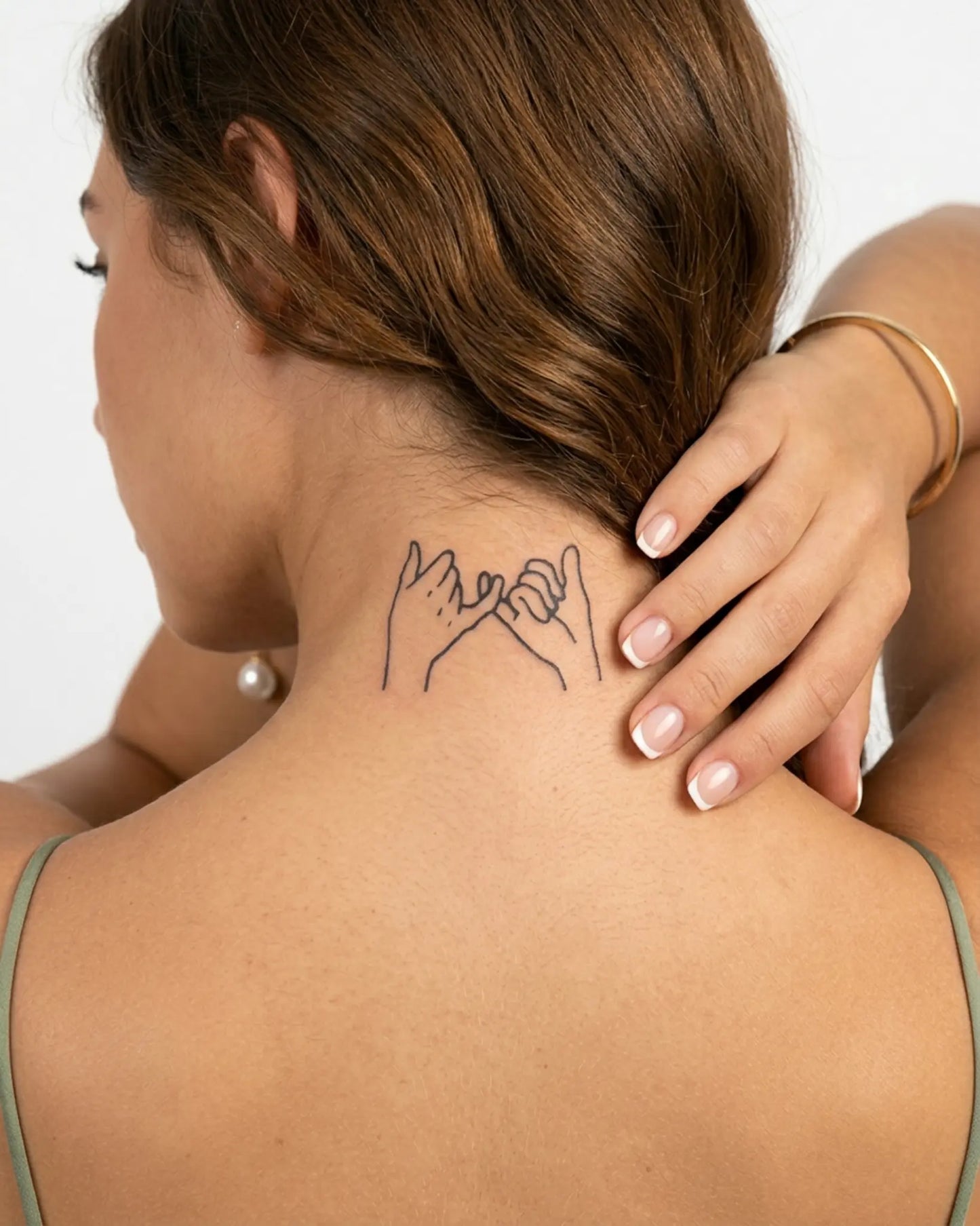 INKY Pinky Promise semi-permanent tattoo applied on a woman – 2 x 2 in (4x4 cm) design, realistic ink look, lasts 10 days