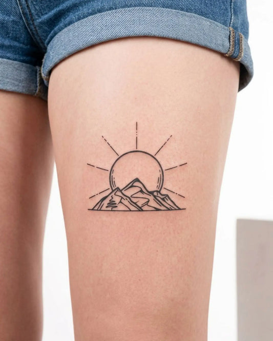 INKY Mountain Sun semi-permanent tattoo applied on a woman – 3 x 4 in (7x10 cm) design, realistic ink look, lasts 10 days