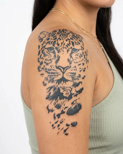 INKY Leopard Face semi-permanent tattoo applied on a woman – 4 x 7 in (10x17 cm) design, realistic ink look, lasts 10 days