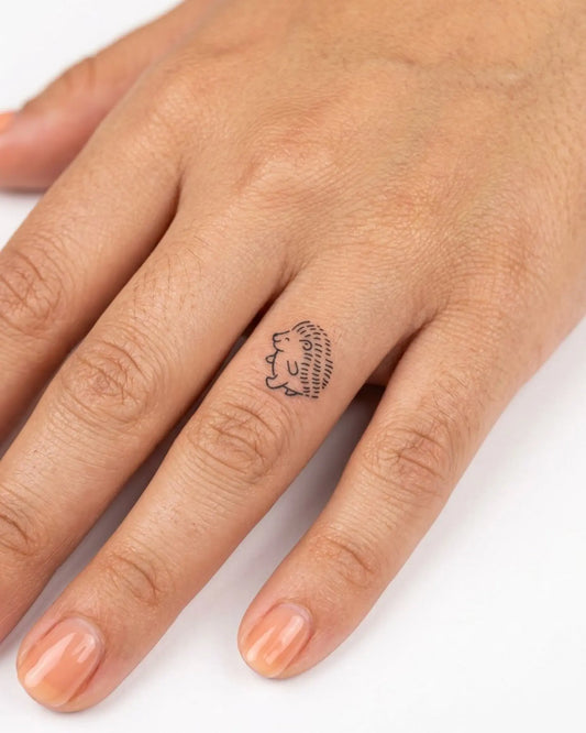 INKY Happy Hedgy 2 semi-permanent tattoo applied on a woman – 0.5 x 0.5 in (1x1 cm) design, realistic ink look, lasts 10 days