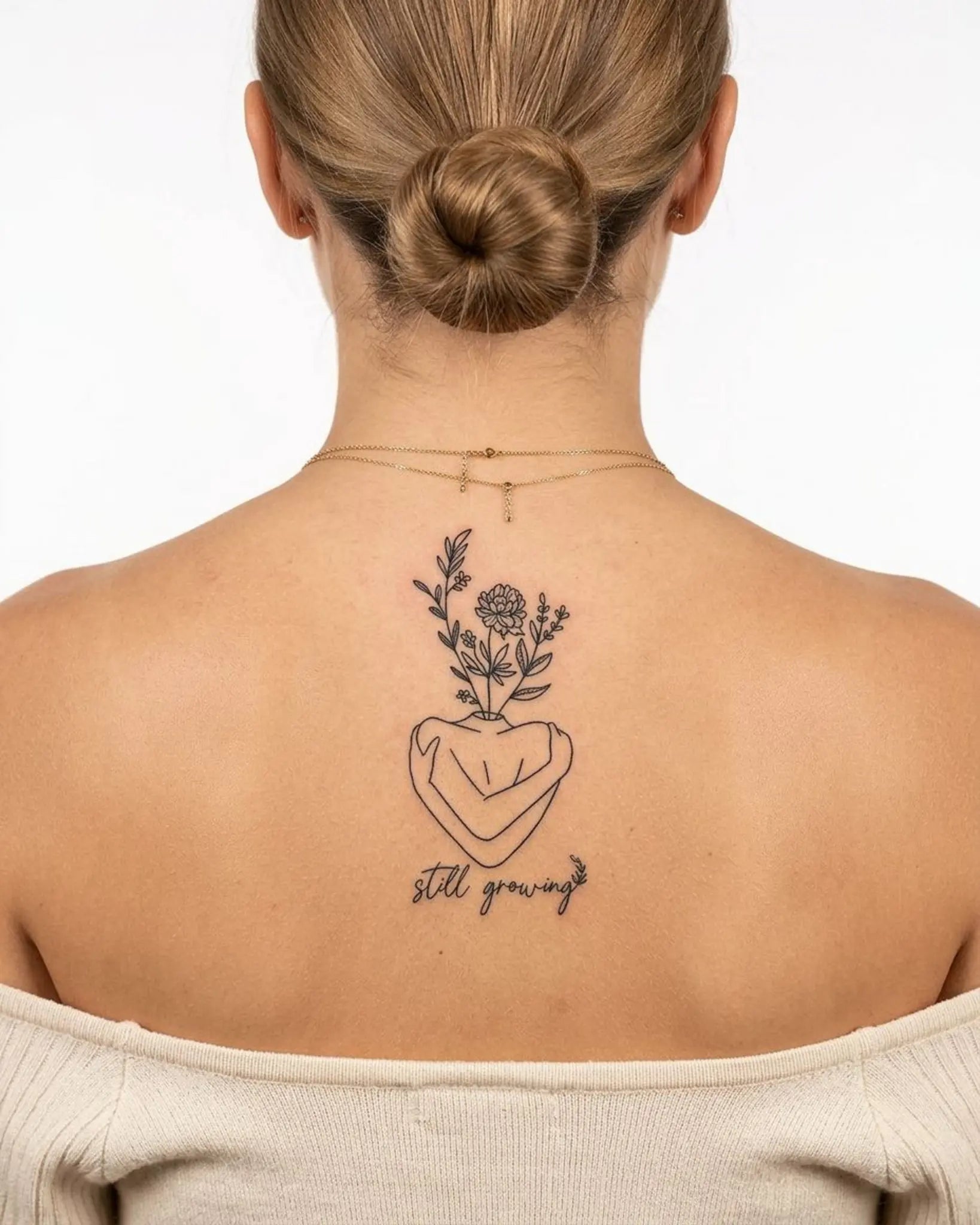 INKY Still Growing semi-permanent tattoo applied on a woman – 2 x 4 in (6x10 cm) design, realistic ink look, lasts 10 days