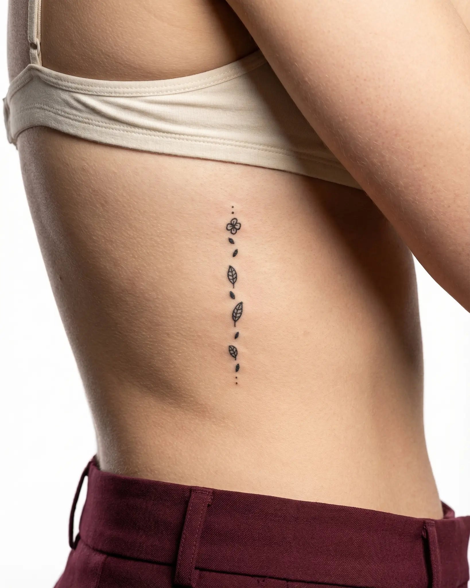 INKY Flora Path semi-permanent tattoo applied on a woman – 2 x 4 in (6x10 cm) design, realistic ink look, lasts 10 days