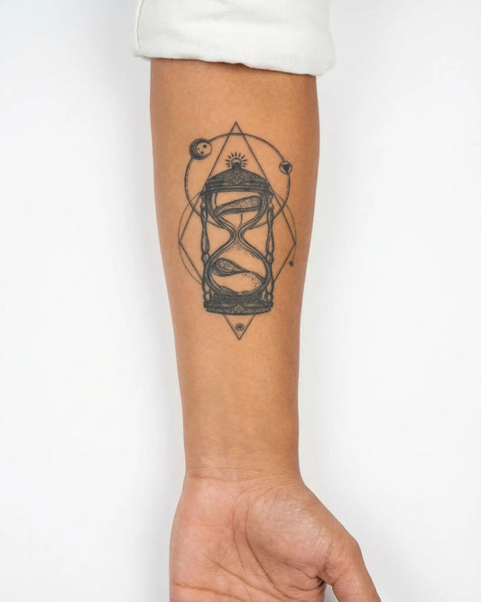 INKY Time & Cosmos semi-permanent tattoo applied on a woman – 3 x 4 in (7x10 cm) design, realistic ink look, lasts 10 days