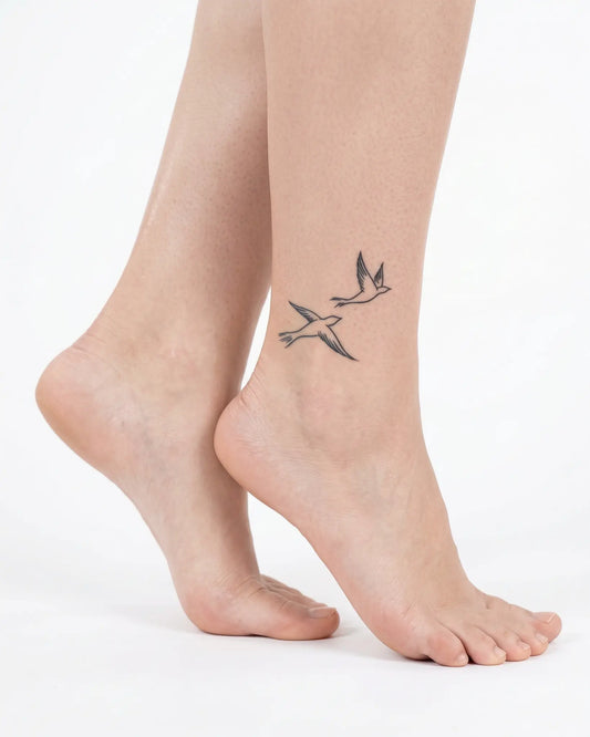 INKY Flying Birds 2 semi-permanent tattoo applied on a woman – 2 x 2 in (4x4 cm) design, realistic ink look, lasts 10 days