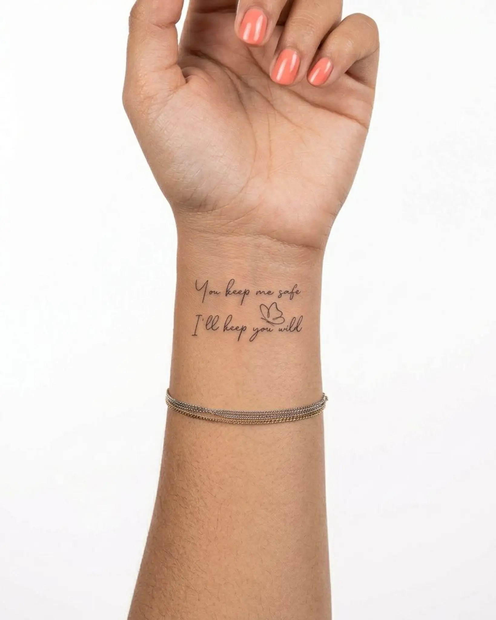 INKY Safe & Wild 2 semi-permanent tattoo applied on a woman – 2 x 2 in (4x4 cm) design, realistic ink look, lasts 10 days