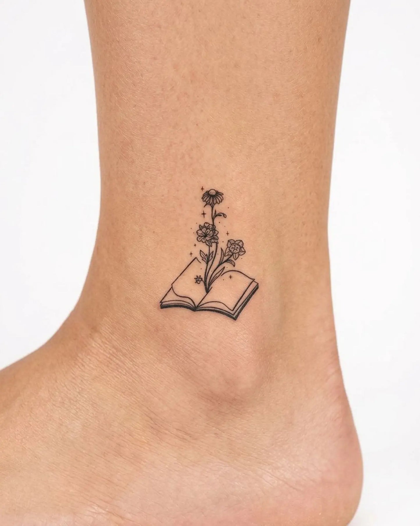 INKY Book Bloom semi-permanent tattoo applied on a woman – 2 x 2 in (4x4 cm) design, realistic ink look, lasts 10 days