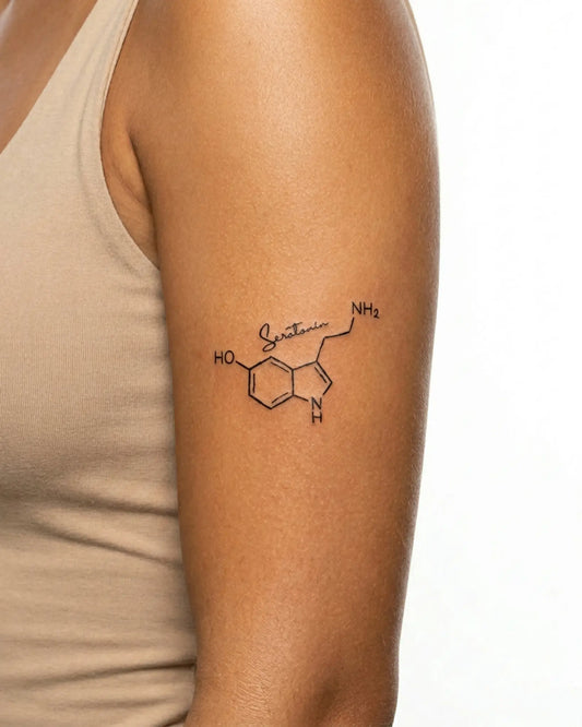 INKY Serotonin semi-permanent tattoo applied on a woman – 3 x 3 in (7x7 cm) design, realistic ink look, lasts 10 days