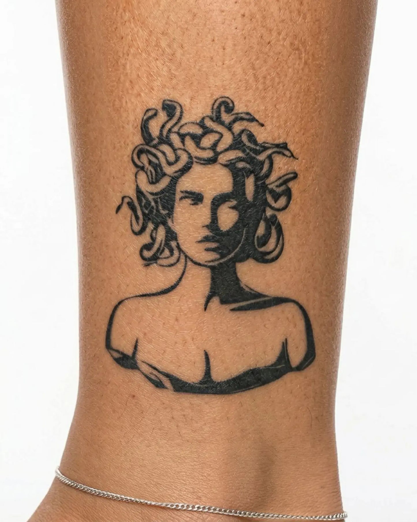INKY Medusa Art semi-permanent tattoo applied on a woman – 3 x 3 in (7x7 cm) design, realistic ink look, lasts 10 days