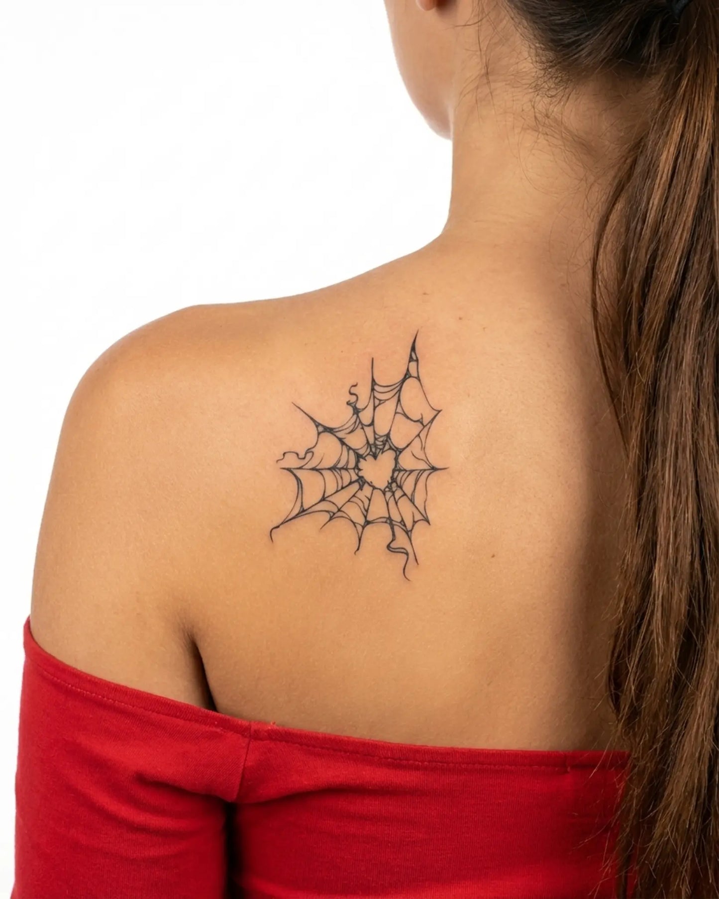 INKY Spider Web 2 semi-permanent tattoo applied on a woman – 3 x 3 in (7x7 cm) design, realistic ink look, lasts 10 days