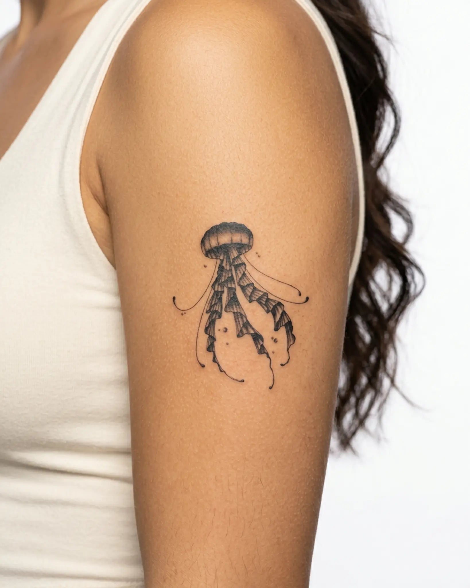 INKY Shadow Jelly semi-permanent tattoo applied on a woman – 3 x 4 in (7x10 cm) design, realistic ink look, lasts 10 days