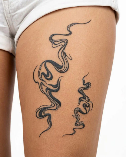 INKY Ink Swirls semi-permanent tattoo applied on a woman – 4 x 7 in (10x17 cm) design, realistic ink look, lasts 10 days