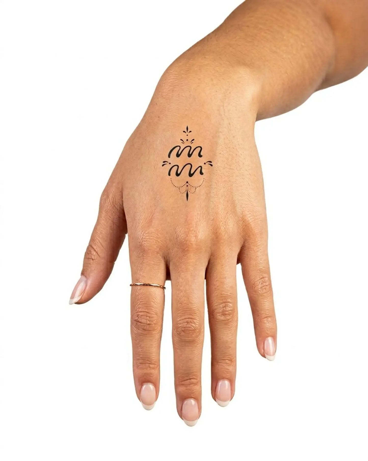 INKY Aquarian semi-permanent tattoo applied on a woman – 2 x 2 in (4x4 cm) design, realistic ink look, lasts 10 days