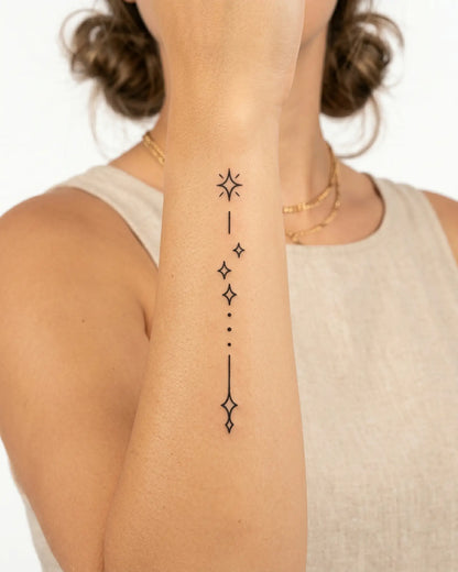 INKY Sparkle Trail semi-permanent tattoo applied on a woman – 2 x 4 in (6x10 cm) design, realistic ink look, lasts 10 days