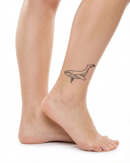 INKY Whale Art semi-permanent tattoo applied on a woman – 2 x 2 in (4x4 cm) design, realistic ink look, lasts 10 days