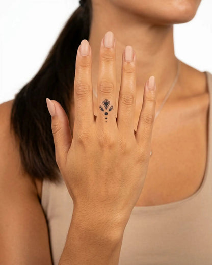 INKY Ornate Dot semi-permanent tattoo applied on a woman – 0.5 x 0.5 in (1x1 cm) design, realistic ink look, lasts 10 days