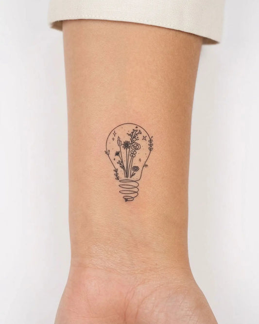 INKY Light Bloom 3 semi-permanent tattoo applied on a woman – 2 x 2 in (4x4 cm) design, realistic ink look, lasts 10 days